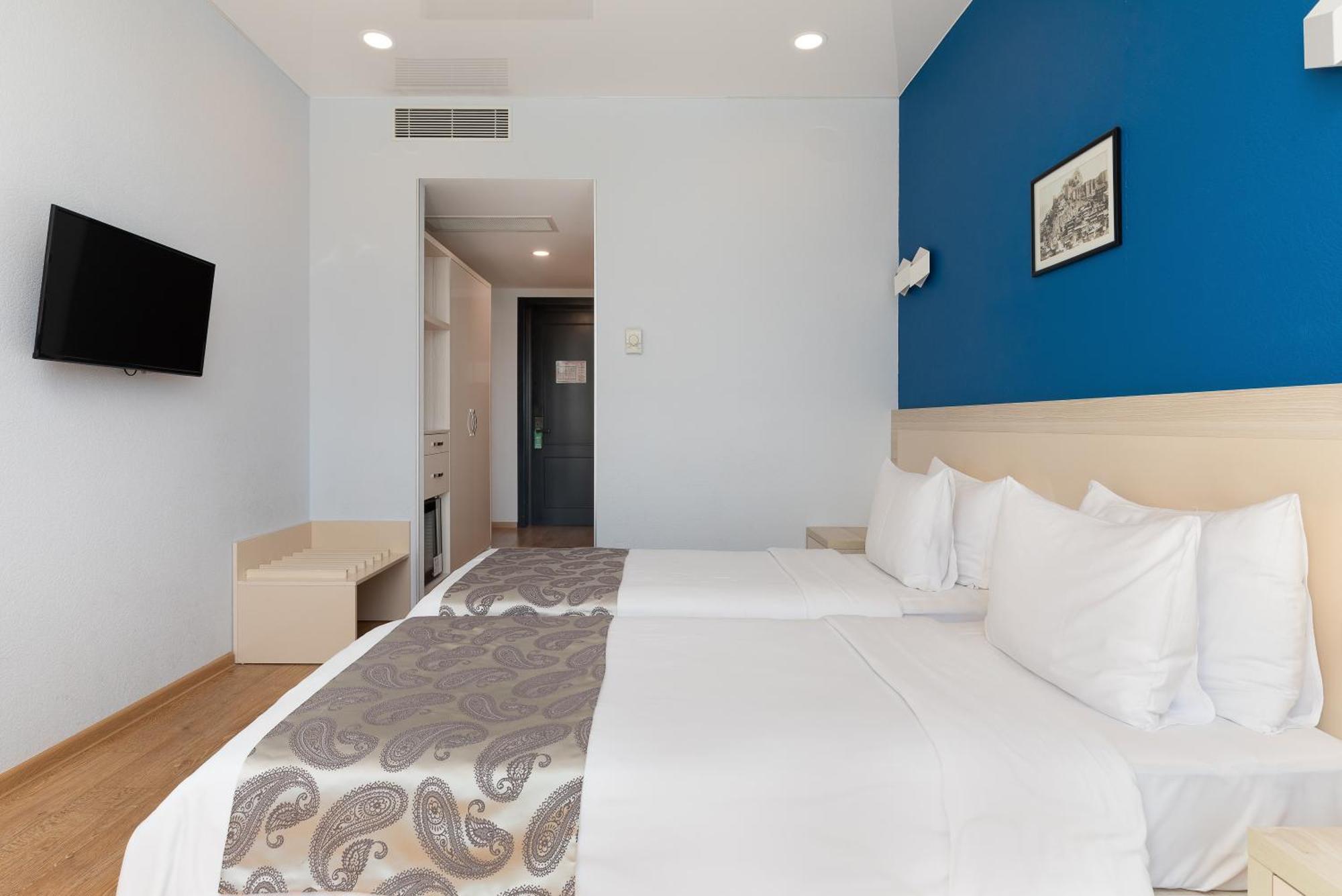 Iveria Inn Hotel Tiflis Habitación foto